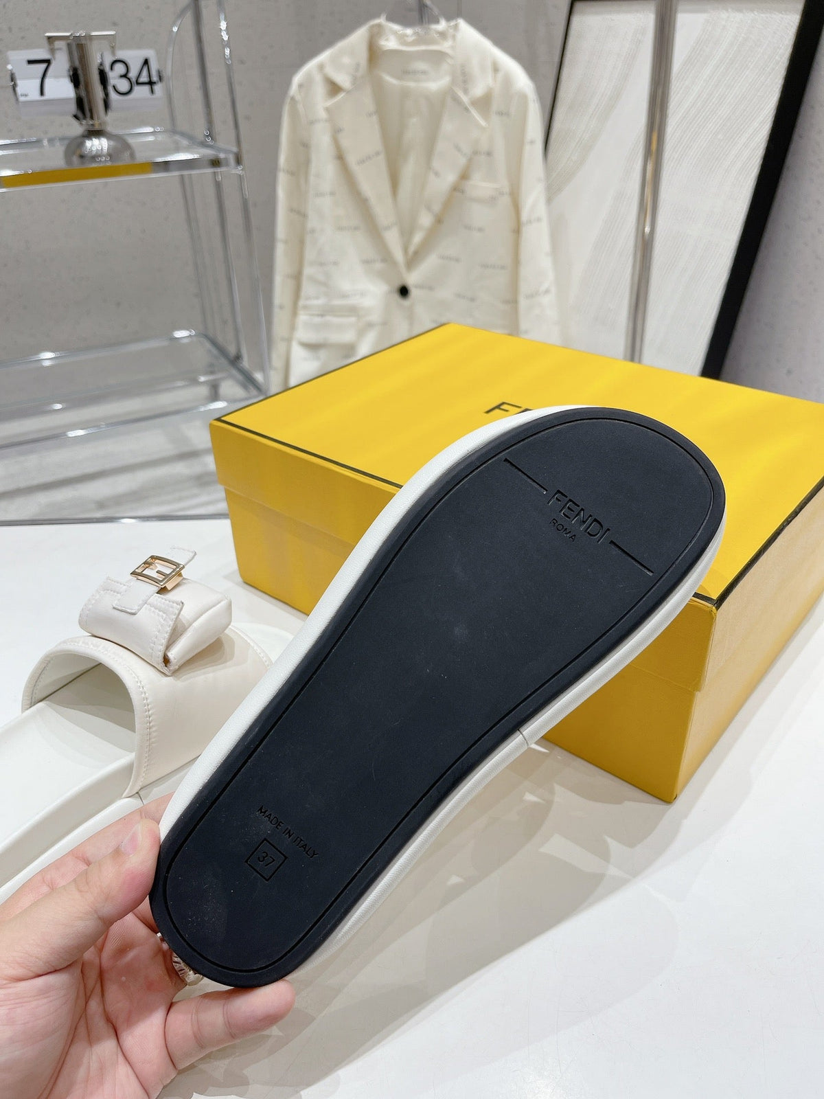 FENDI BAGUETTE SLIPPERS IN WHITE LAMBSKIN WITH GOLD HARDWARE