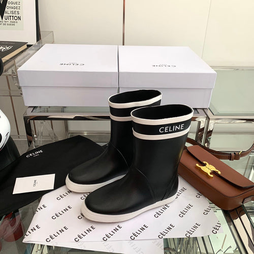 RAIN BOOTS IN BLACK MIX WHITE RUBBER