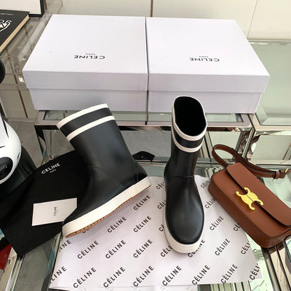 RAIN BOOTS IN BLACK MIX WHITE RUBBER
