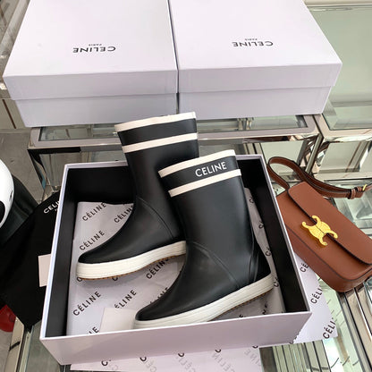 RAIN BOOTS IN BLACK MIX WHITE RUBBER