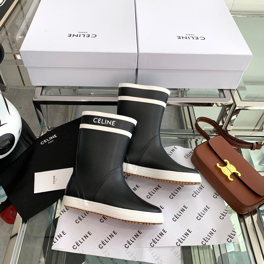 RAIN BOOTS IN BLACK MIX WHITE RUBBER