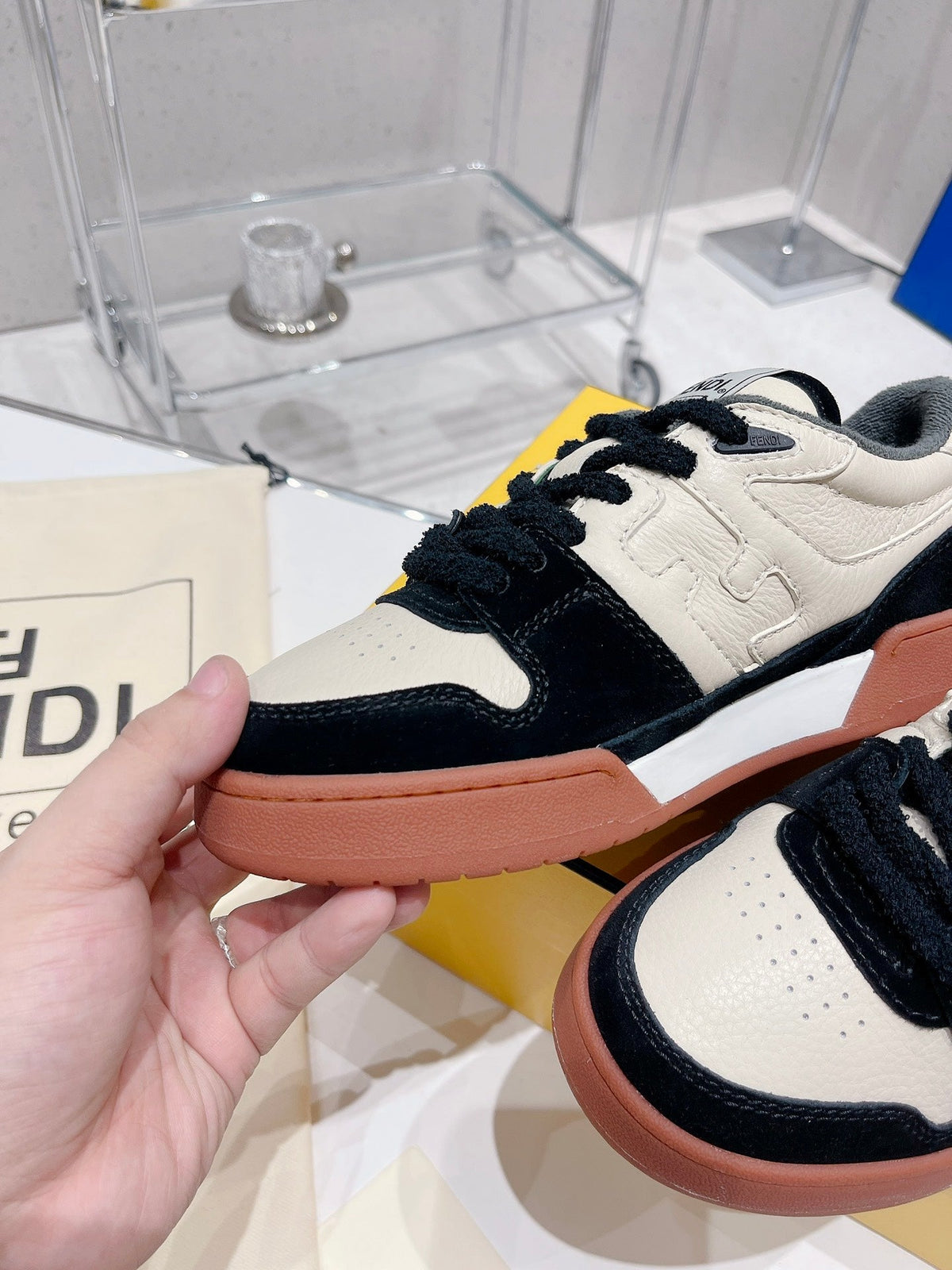 FENDI CASUAL SNEAKER IN WHITE CALFSKIN AND BLACK SUEDE