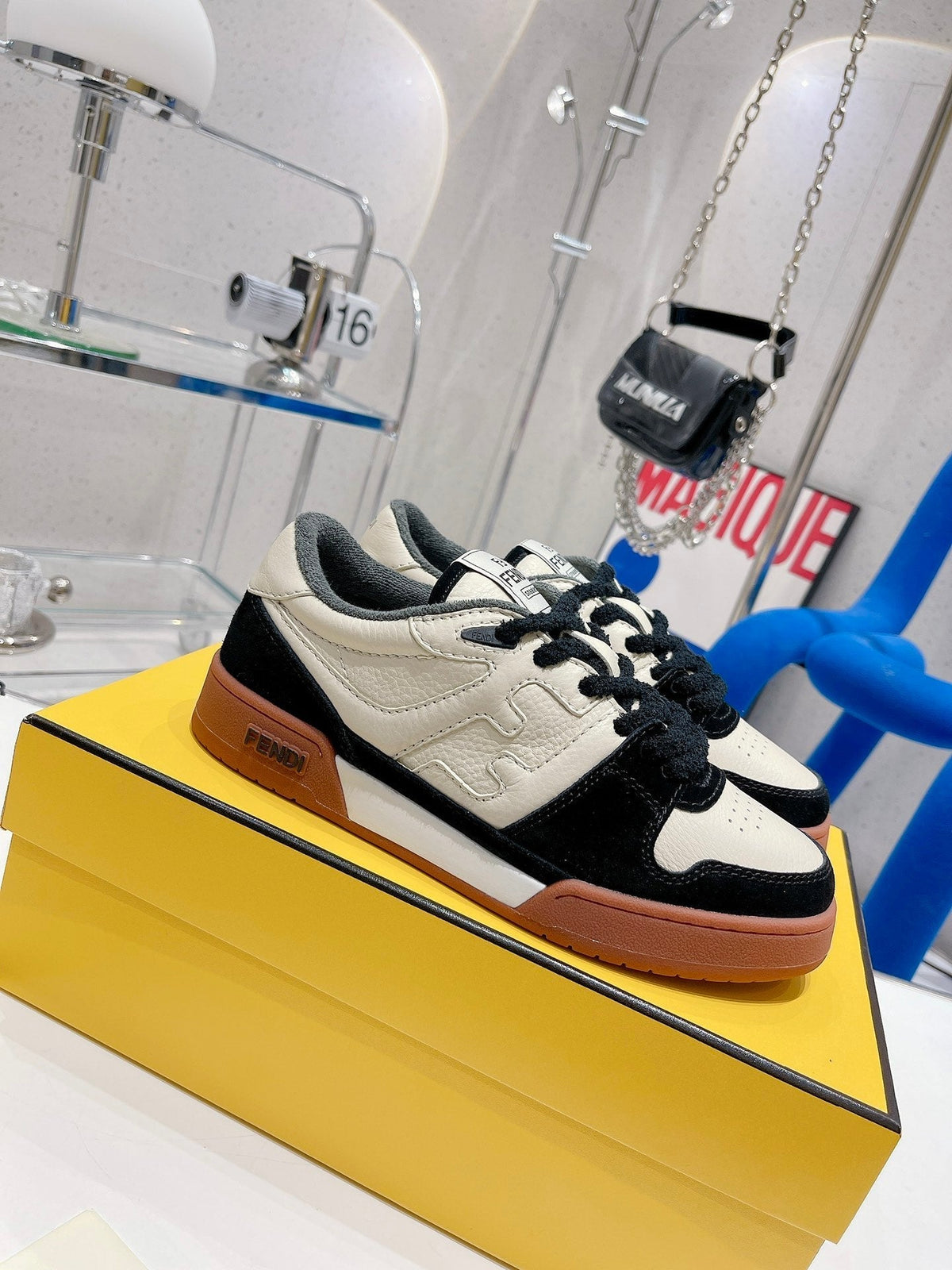 FENDI CASUAL SNEAKER IN WHITE CALFSKIN AND BLACK SUEDE