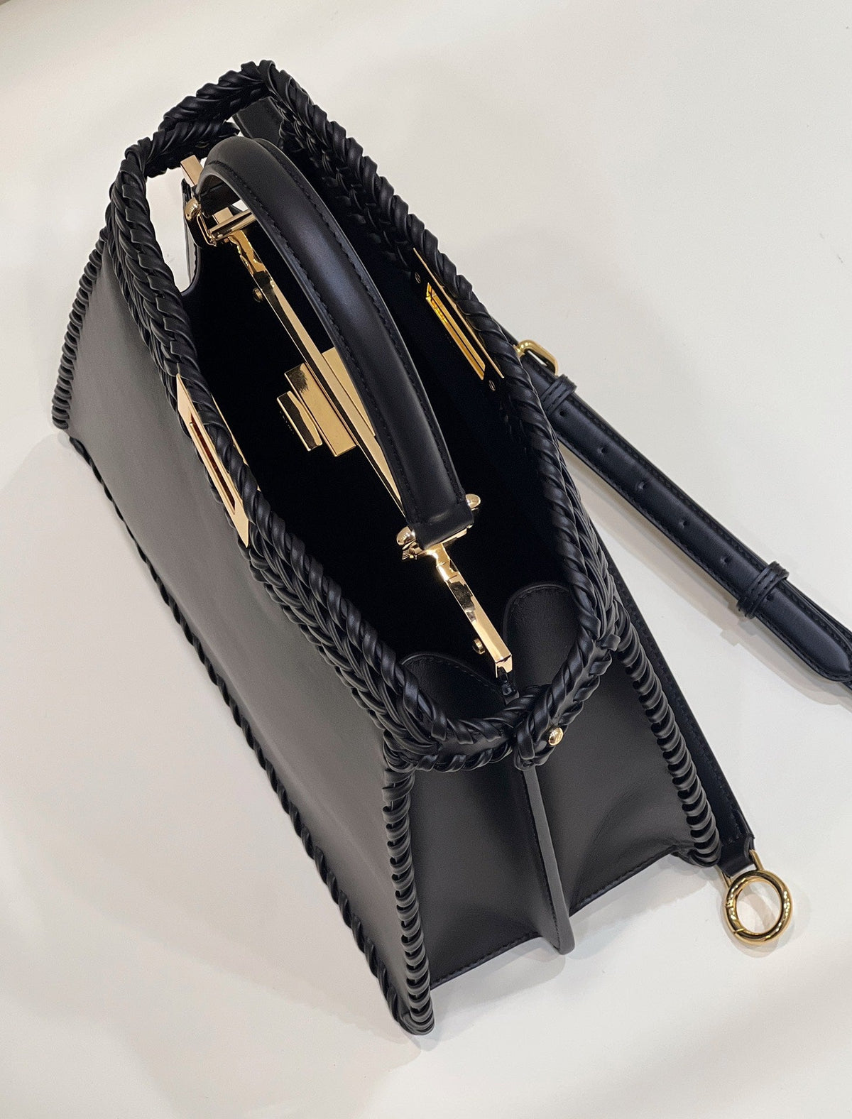 PEEKABOO ISEEU 27 IN BLACK SMOOTH CALFSKIN WITH WOVEN TRIM GOLD HARDWARE