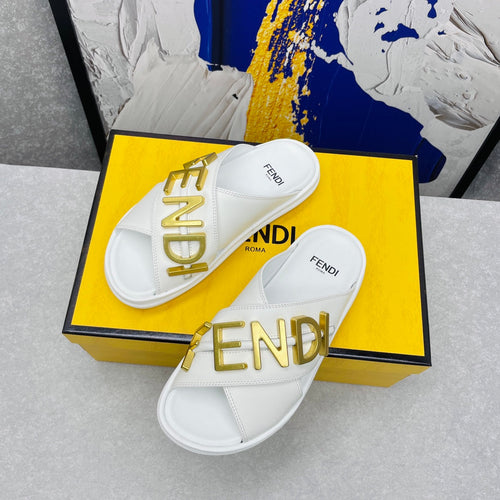 FENDI GRAPHY LOGO LETTERING SLIDES IN WHITE LAMBSKIN WITH GOLD HARDWARE