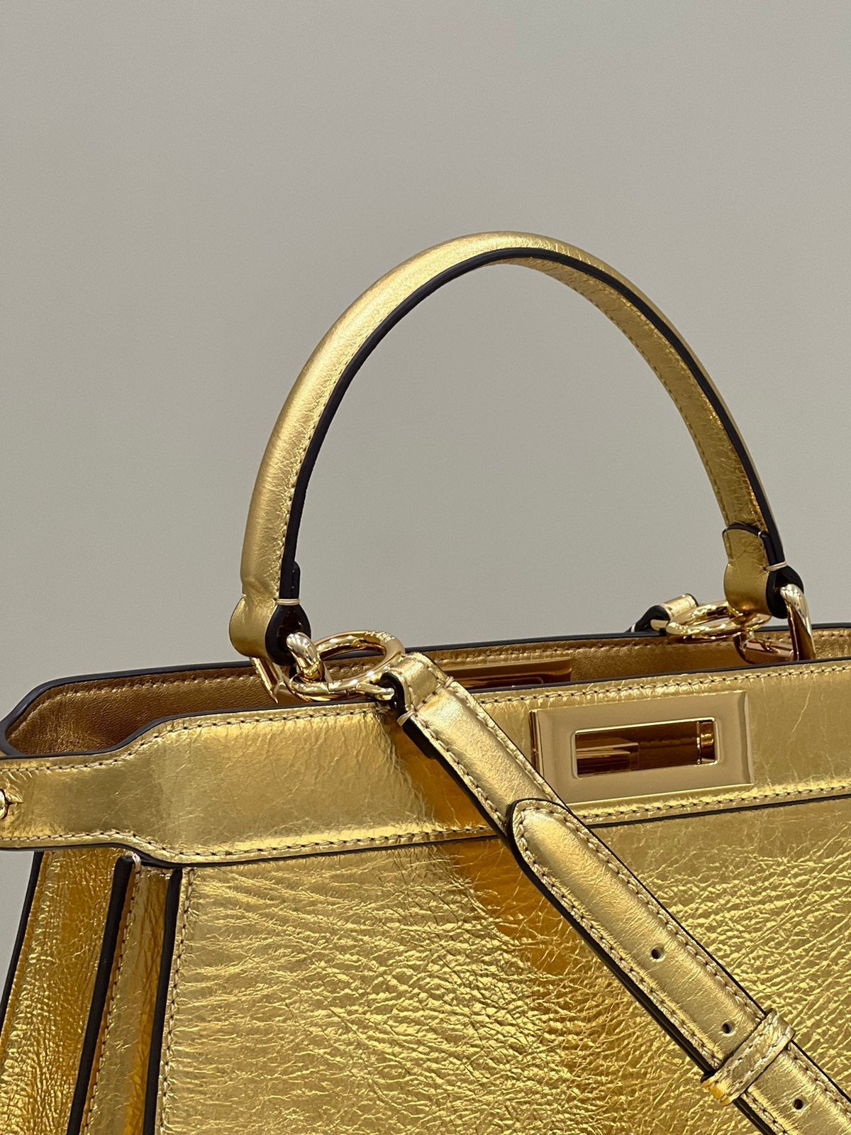 PEEKABOO ISEEU 33 IN GOLD METALLIC CALFSKIN GOLD HARDWARE
