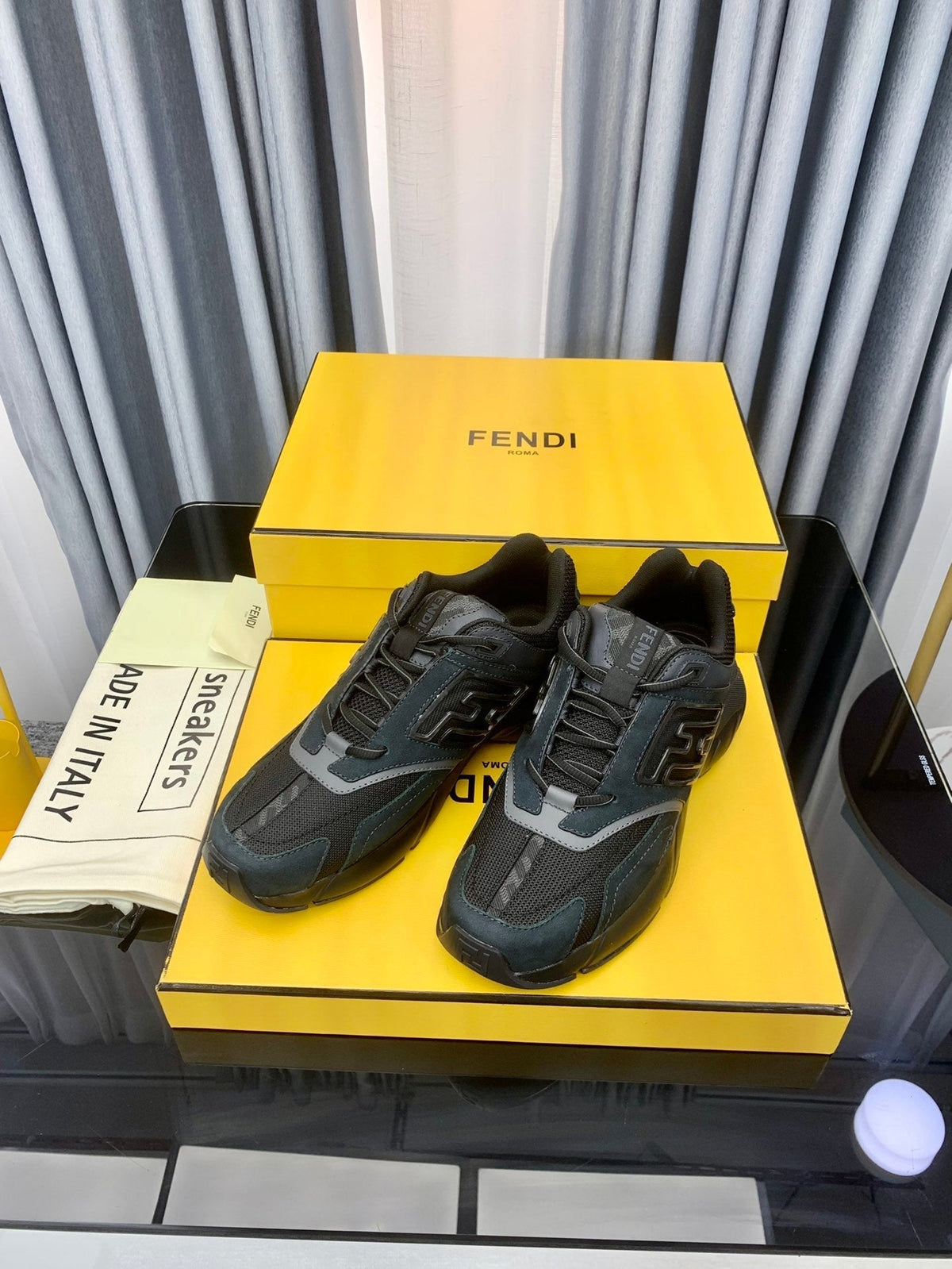 FENDI FASTER TRAINER IN BLACK CALFSKIN AND SUEDE