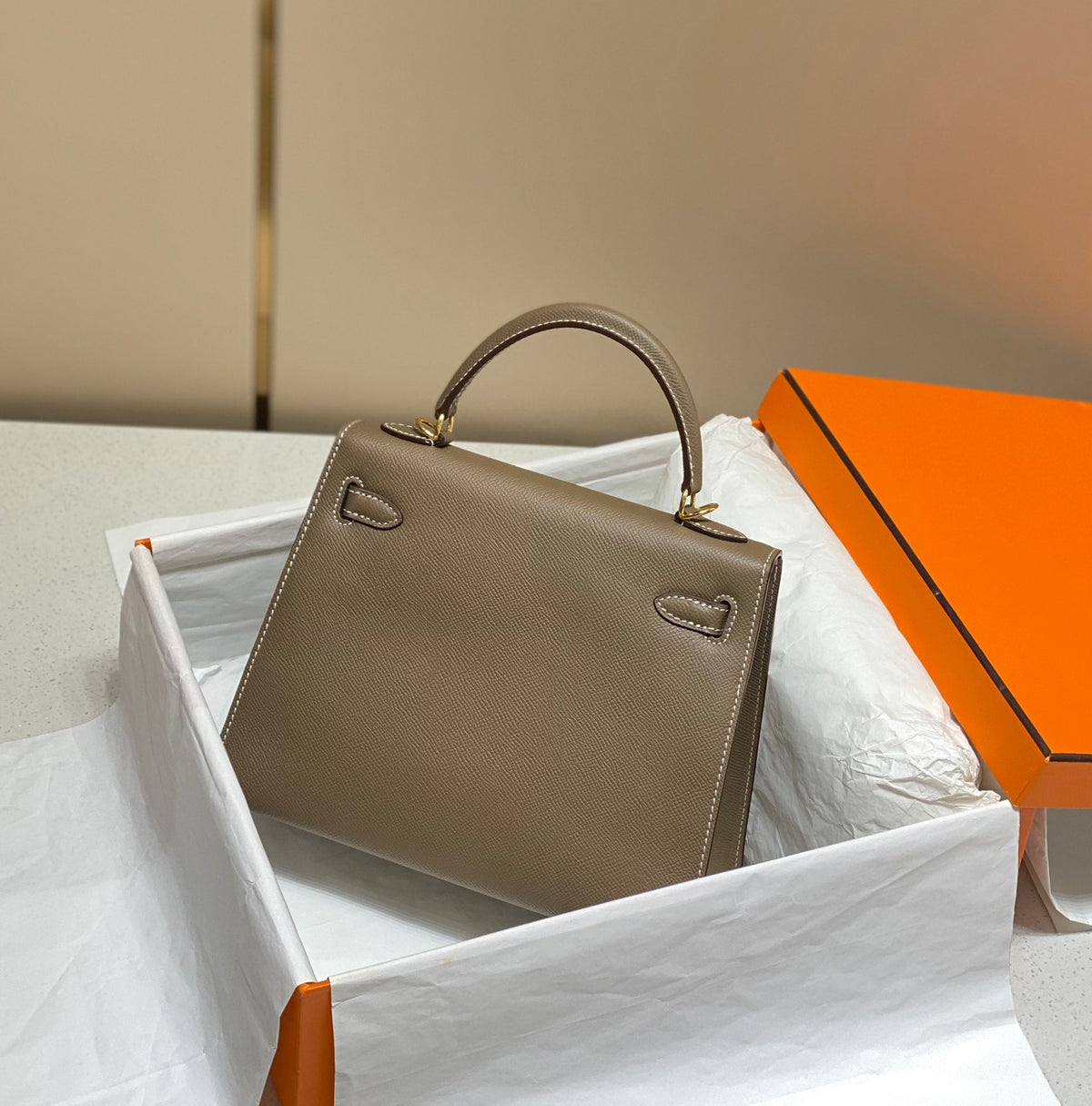 KELLY 25CM IN ETOUPE EPSOM CALFSKIN GOLD HARDWARE