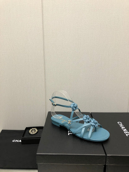 FLORAL FLAT SANDAL IN SAPPHIRE BLUE LAMBSKIN