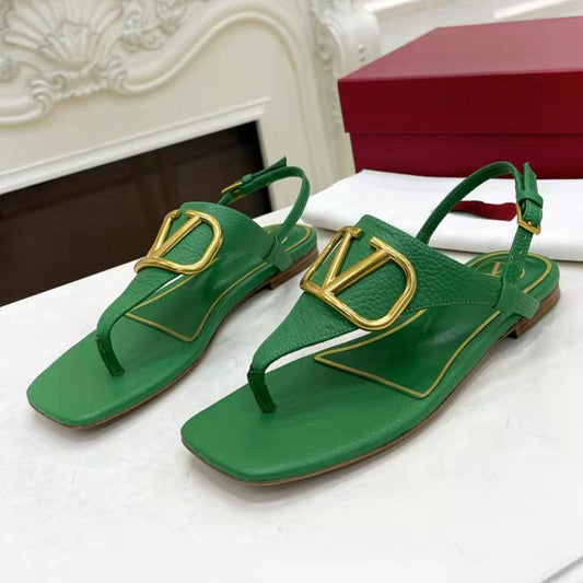 THONG SANDALS IN EMERALD GREEN CALFSKIN WITH GOLD LOGO
