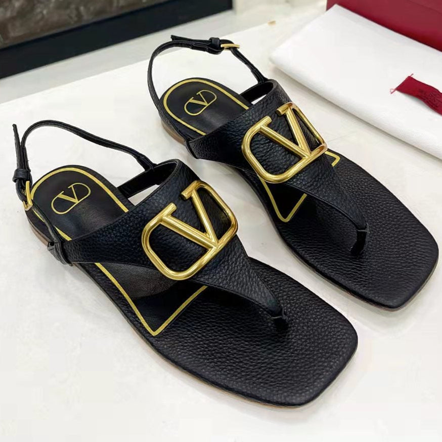 THONG SANDALS IN BLACK CALFSKIN WITH GOLD LOGO