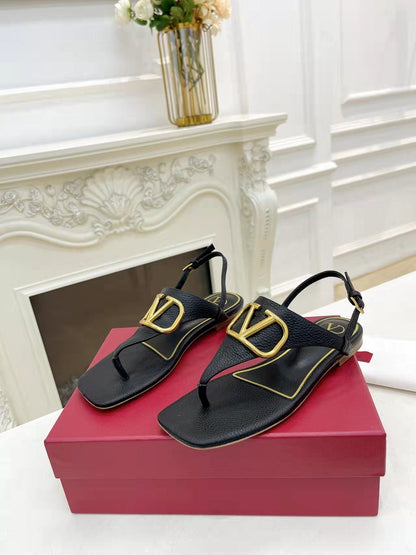 THONG SANDALS IN BLACK CALFSKIN WITH GOLD LOGO
