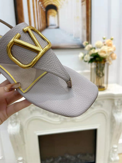 THONG SANDALS IN THISTLE PURPLE CALFSKIN WITH GOLD LOGO