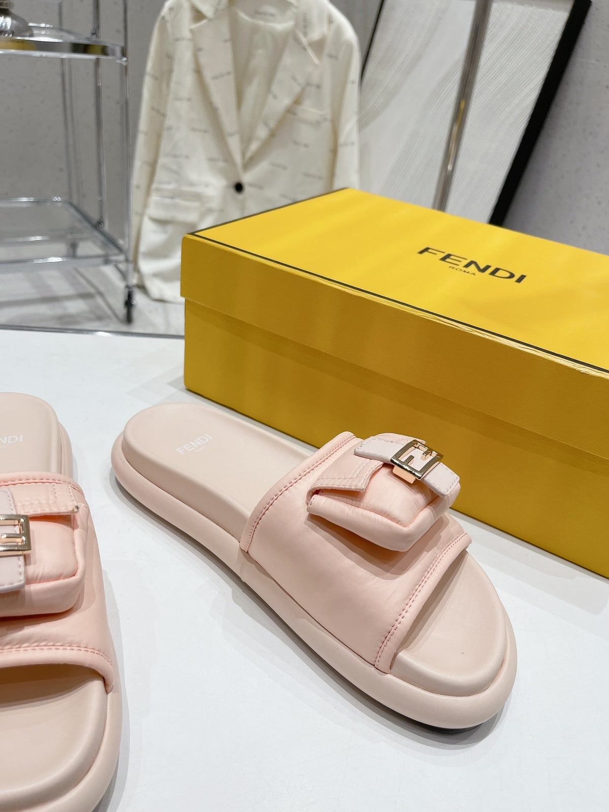 FENDI BAGUETTE SLIPPERS IN PASTEL PINK LAMBSKIN WITH GOLD HARDWARE