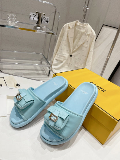FENDI BAGUETTE SLIPPERS IN SKY BLUE LAMBSKIN WITH GOLD HARDWARE