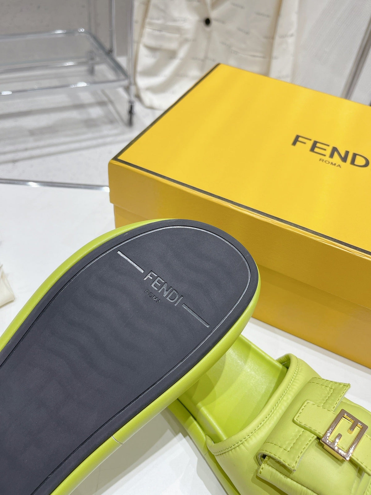 FENDI BAGUETTE SLIPPERS IN PEAR GREEN LAMBSKIN WITH GOLD HARDWARE