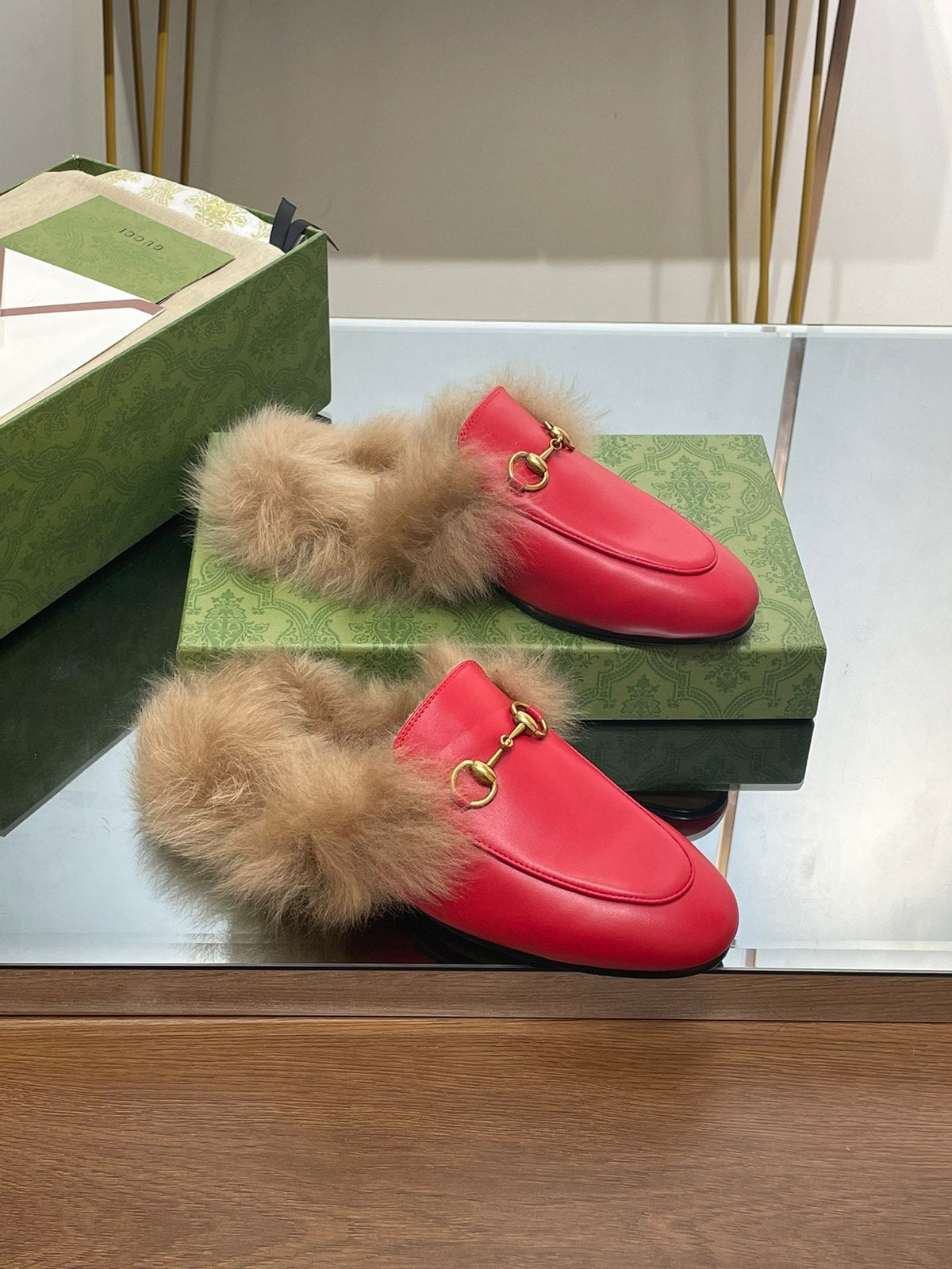 HORSEBIT MULE IN CHERRY RED CALFSKIN AND LAMB WOOL LINING