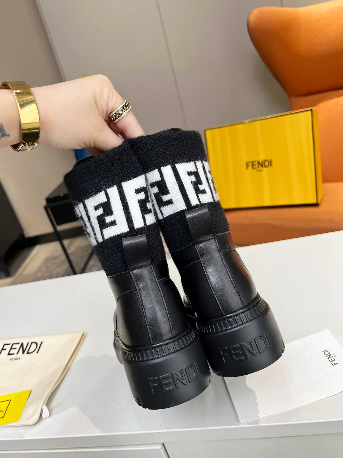 FENDI MARTIN BOOTS IN BLACK CALFSKIN AND FUR