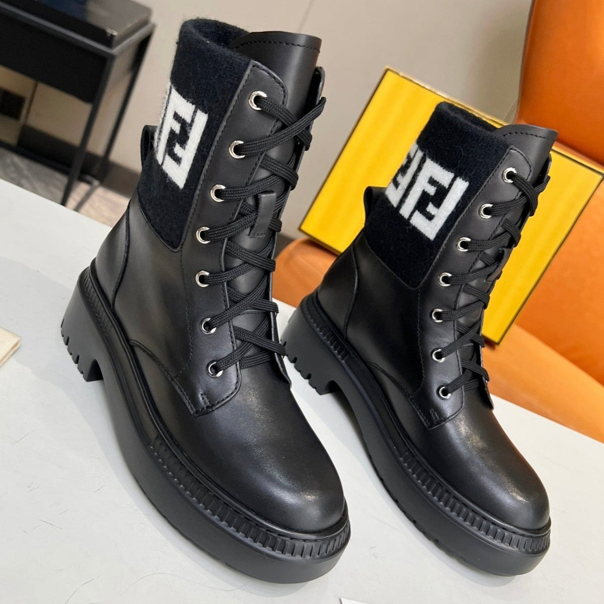 FENDI MARTIN BOOTS IN BLACK CALFSKIN AND FUR