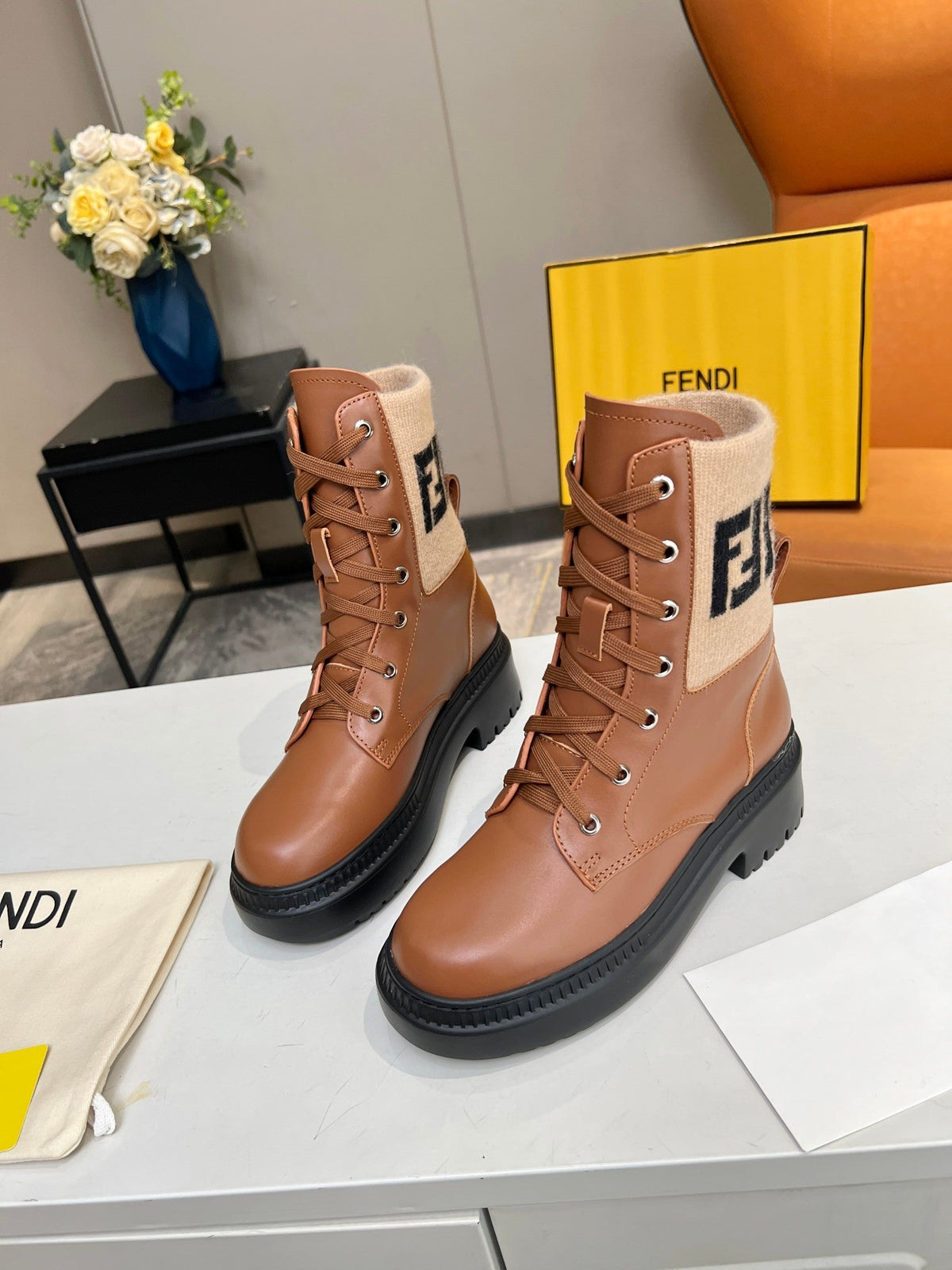 FENDI MARTIN BOOTS IN BRONZE BROWN CALFSKIN AND FUR