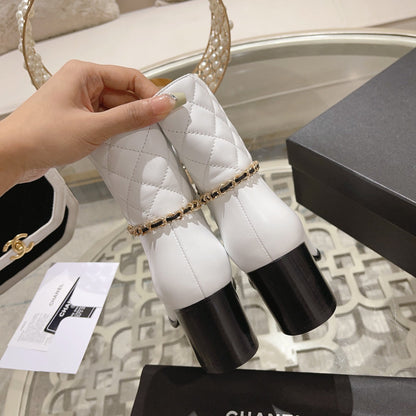 MID-HEEL ANKLE BOOTS IN WHITE CALFSKIN