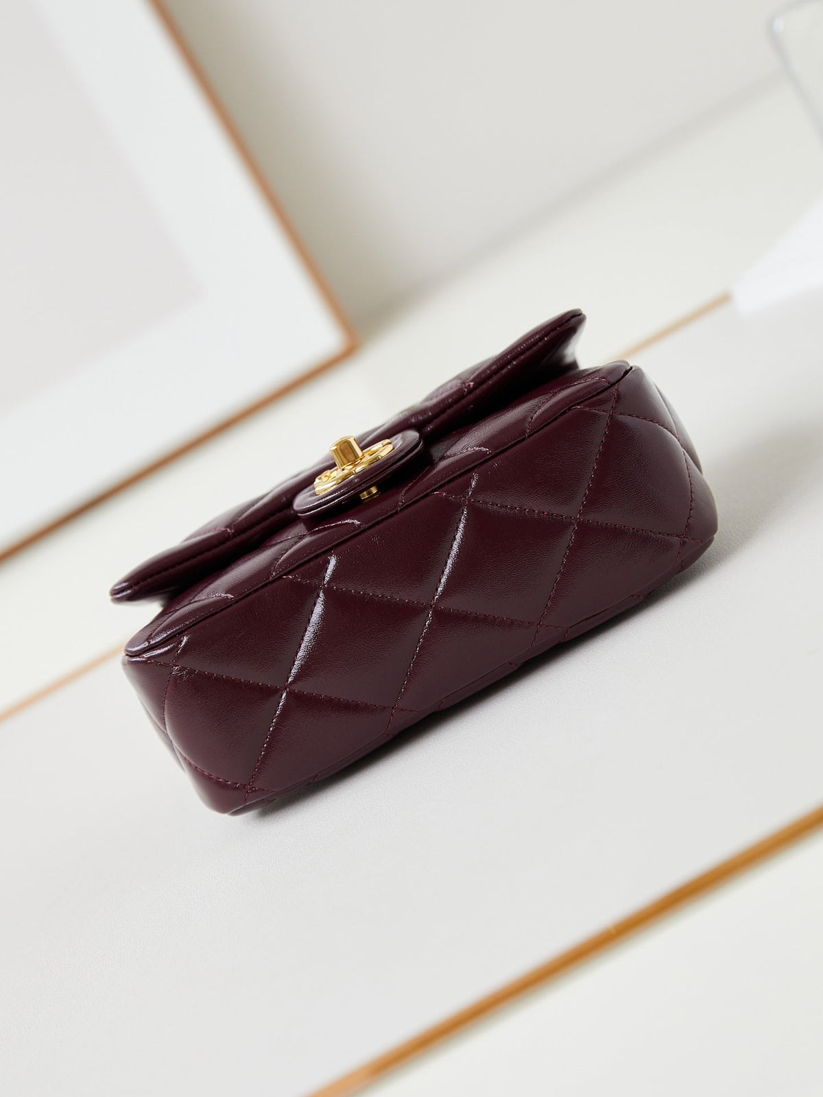 FLAP BAG WITH TOP HANDLE 19 IN WINE RED OIL-WAX LAMBSKIN GOLD HARDWARE