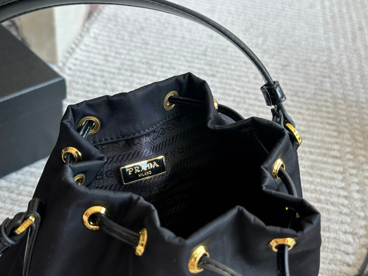 DRAWSTRING HOBO BAG 21 IN BLACK RE-NYLON AND CALFSKIN HANDLE