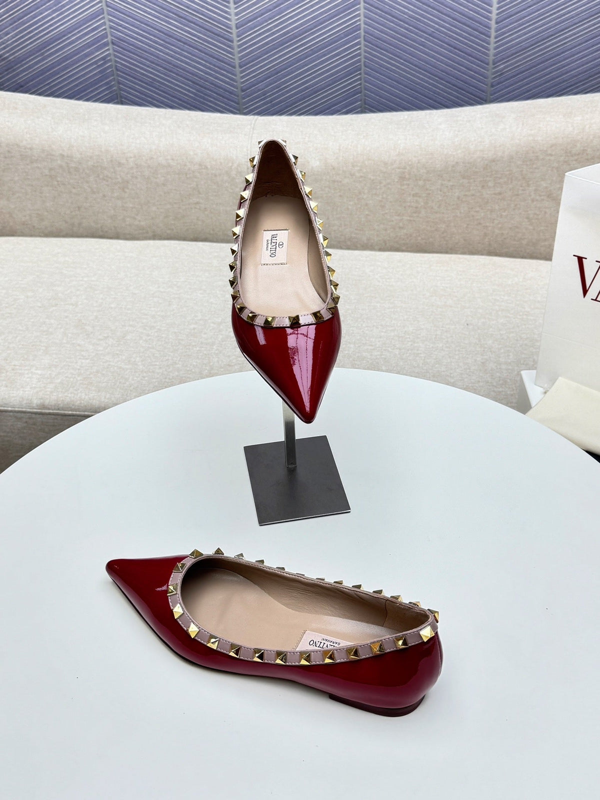 ROCKSTUD FLAT PUMP IN BERRY RED CALFSKIN