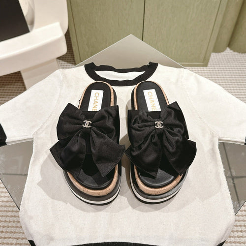 CC SLIPPERS WITH SILK BOW IN BLACK COWHIDE
