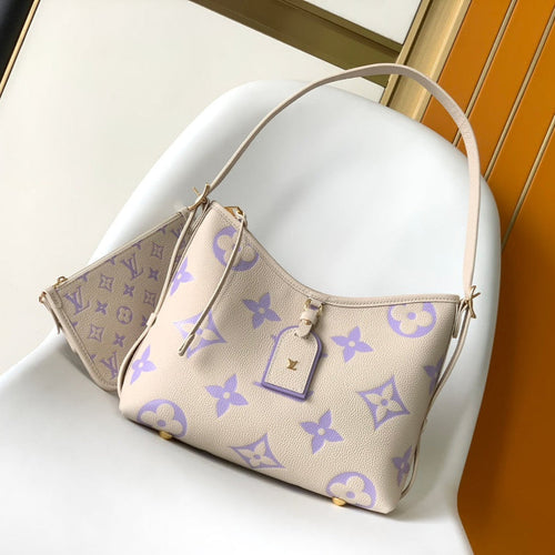 CARRYALL PM 29 BAG IN BEIGE MIX PURPLE MONOGRAM EMPREINTE LEATHER