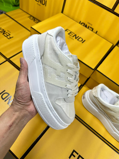 FENDI THICK-SOLDED SNEAKER IN WHITE SUEDE AND MONOGRAM FABRIC