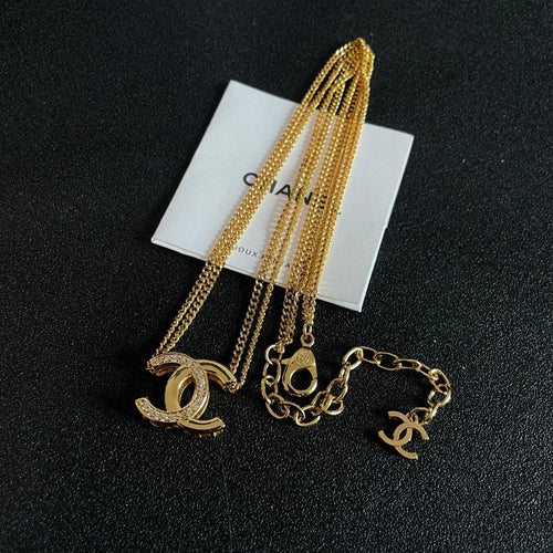 DOUBLE C HEART NECKLACE IN GOLD METAL
