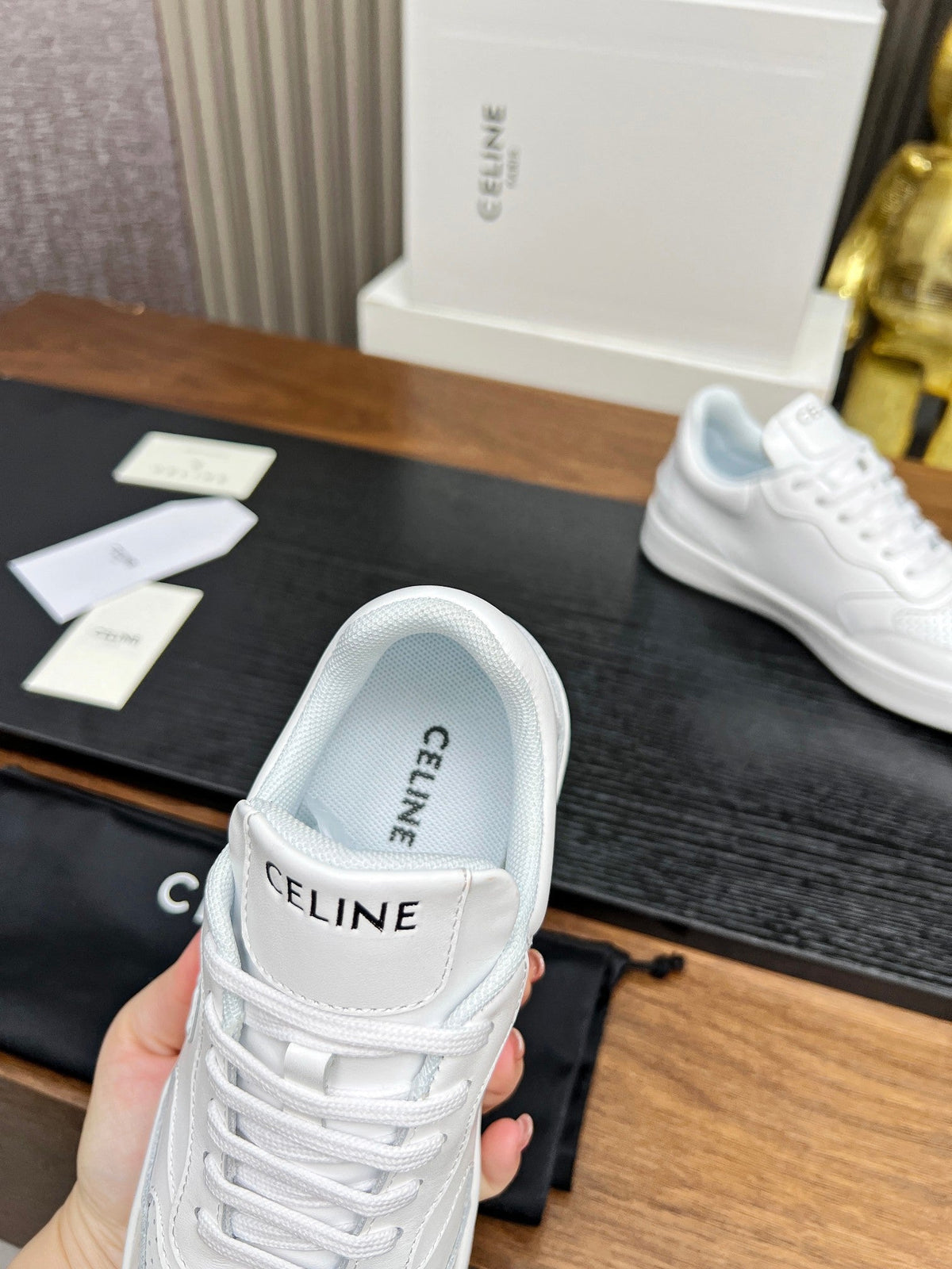 SNEAKER WITH TRIOMPHE IN WHITE CALFSKIN