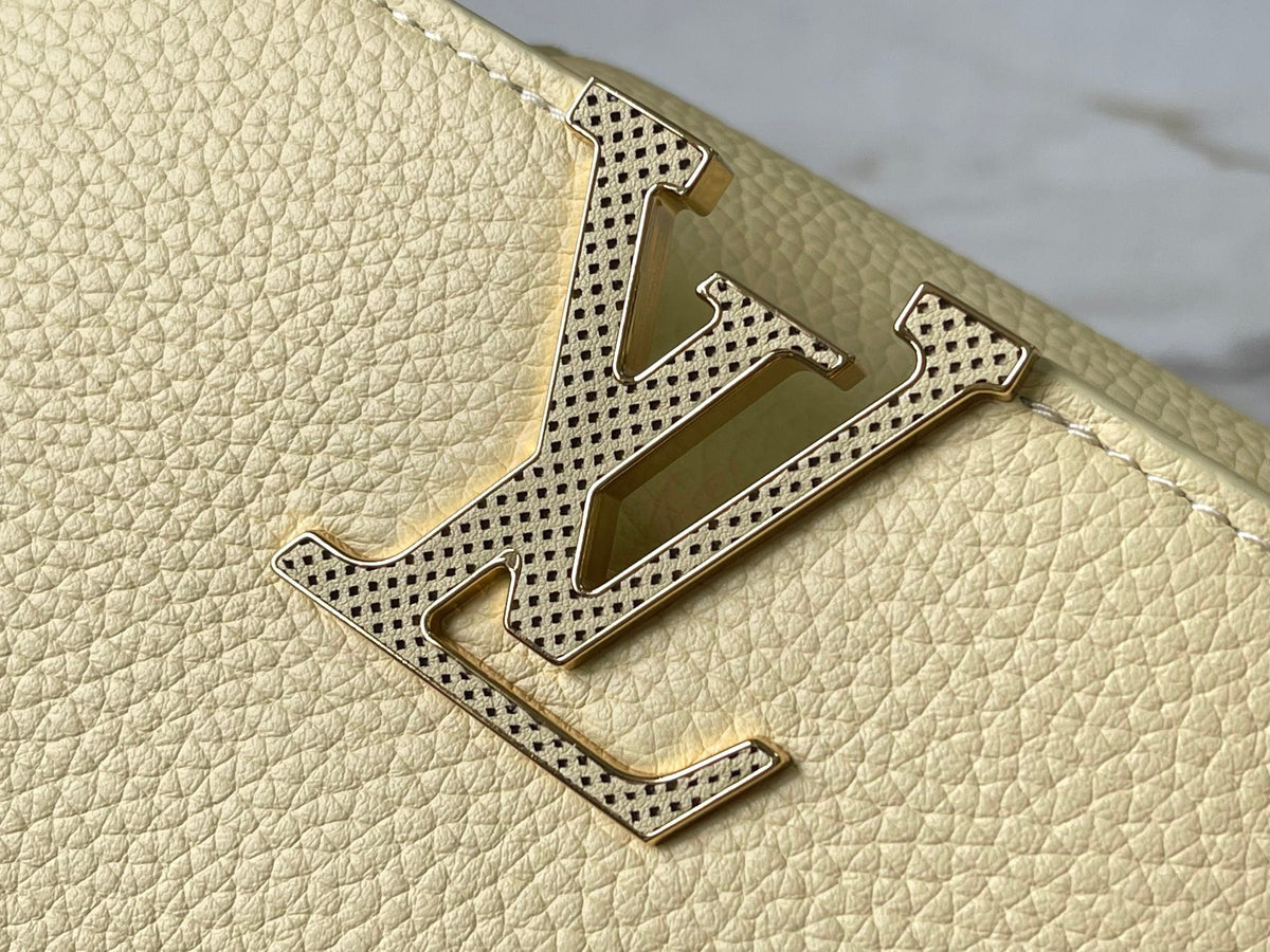 CAPUCINES EAST-WEST MINI 22 IN BANANA YELLOW TAURILLON GOLD HARDWARE