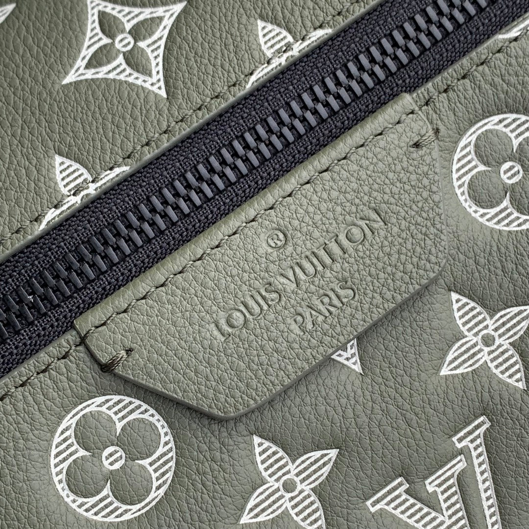 DISCOVERY PM BACKPACK 38 IN OLIVE GREEN MONOGRAM LAMBSKIN
