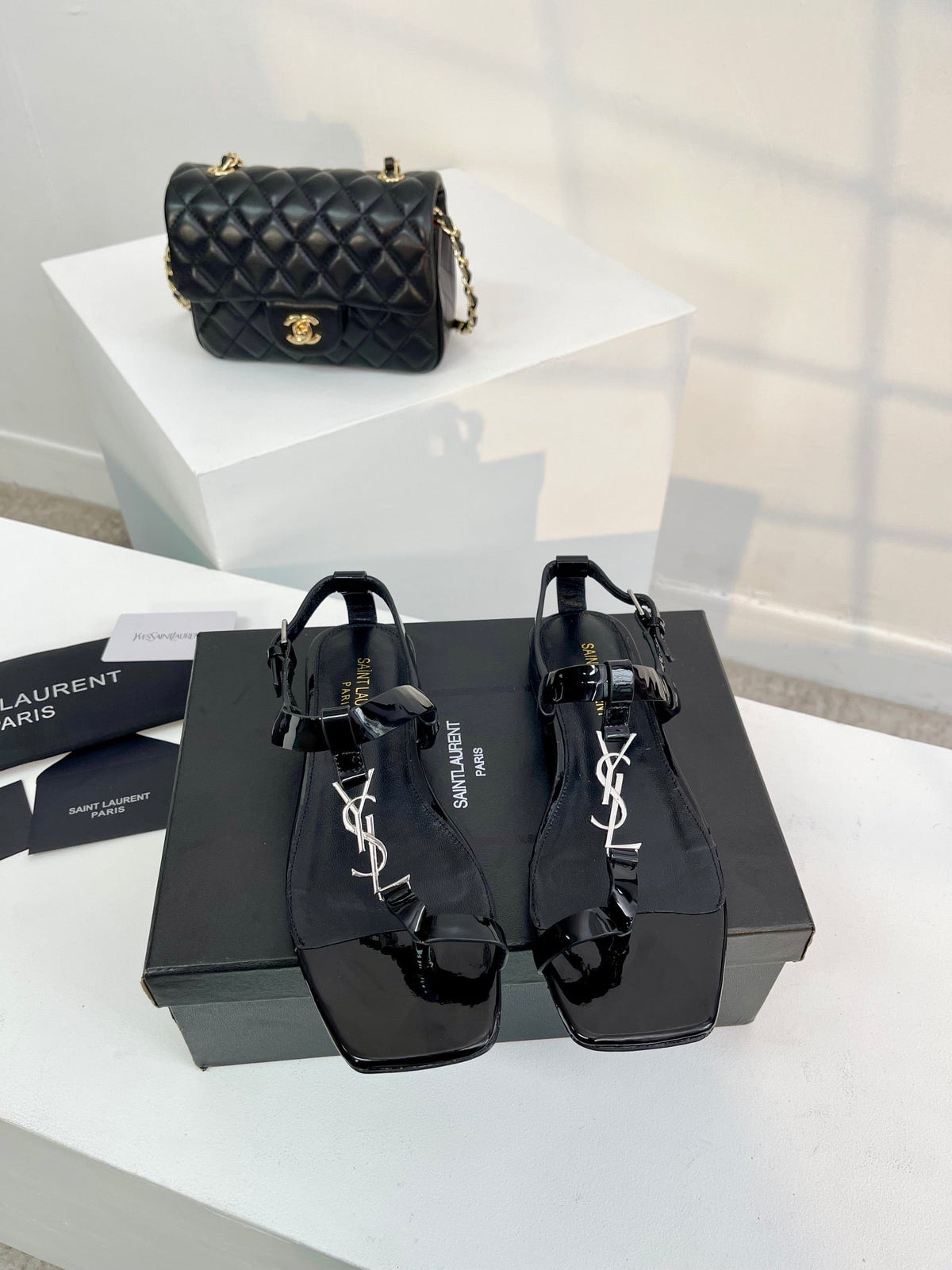 SL CASSANDRA ONE SANDAL FLAT BLACK CALFSKIN