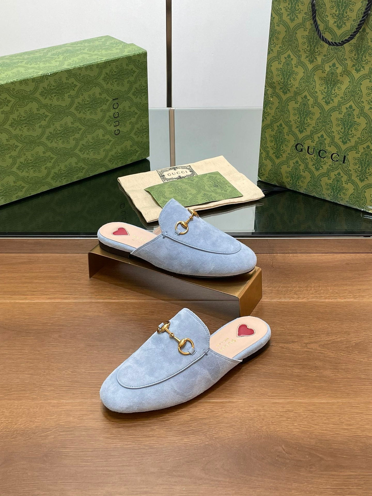 HORSEBIT MULE IN LIGHT BLUE SUEDE WITH GOLD HARDWARE