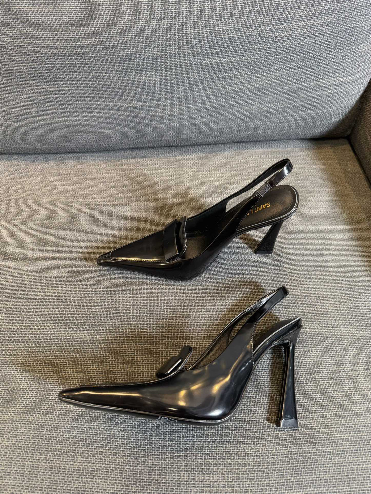 POINTED-TOE SLINGBACK PUMPS IN BLACK SHINY CALFSKIN