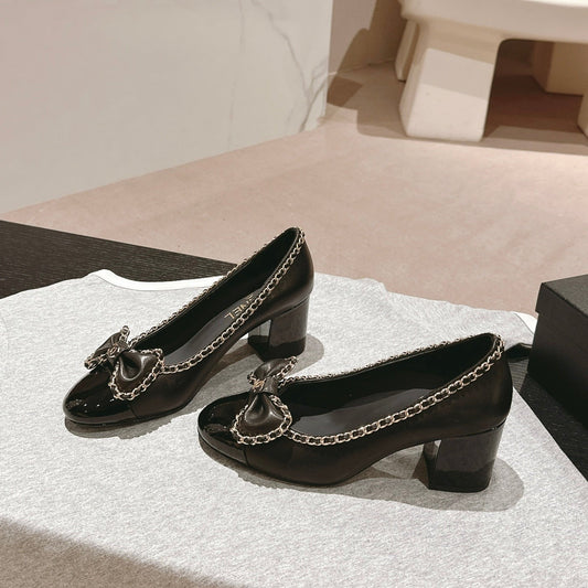 BOWKNOT HIGH HEELS IN BLACK SHEEPSKIN