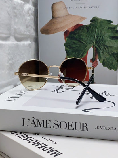 SIGNATURE ROUND SUNGLASS 581382 IN GOLD METAL BROWN SMOKE LENSES