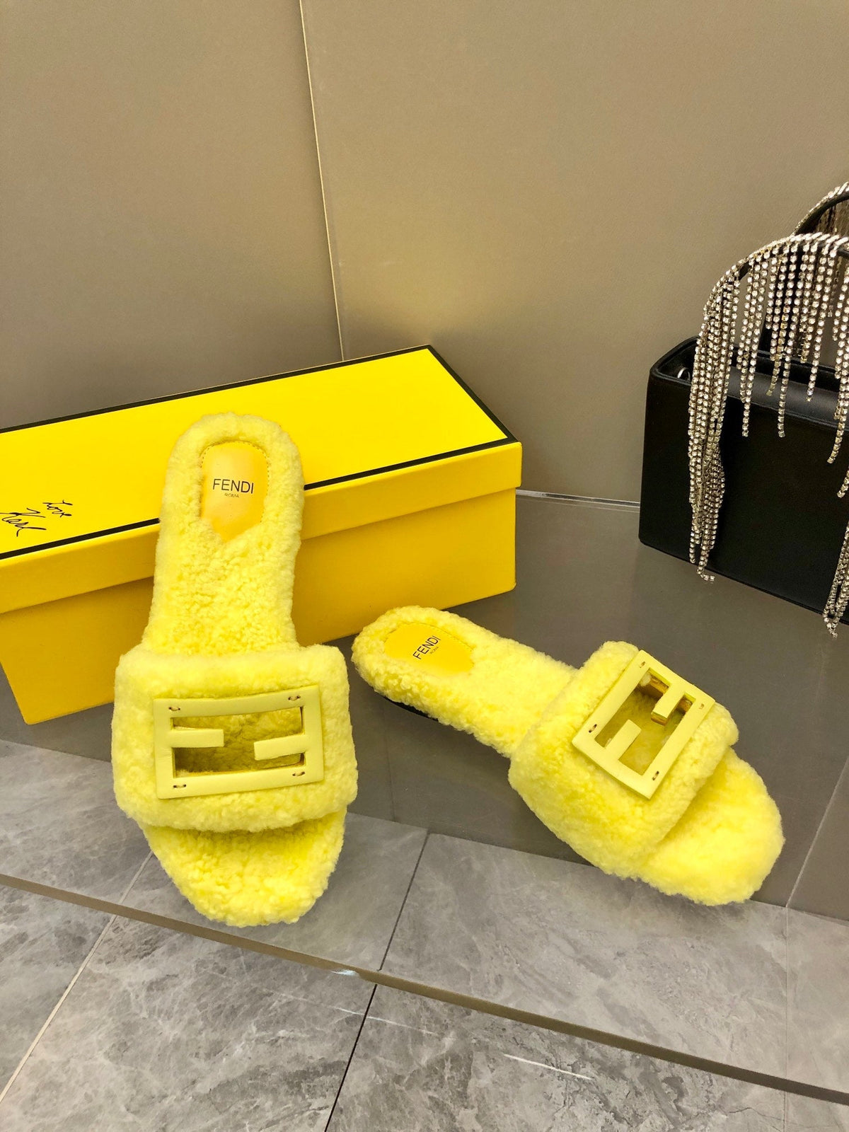 FENDI BAGUETTE SLIDE SLIPPERS IN BRIGHT YELLOW WOOL