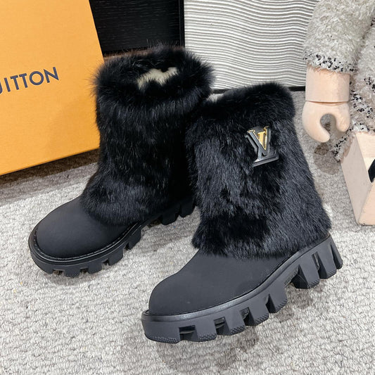 ANKLE BOOTS IN BLACK CALFSKIN WITH MINK FUR