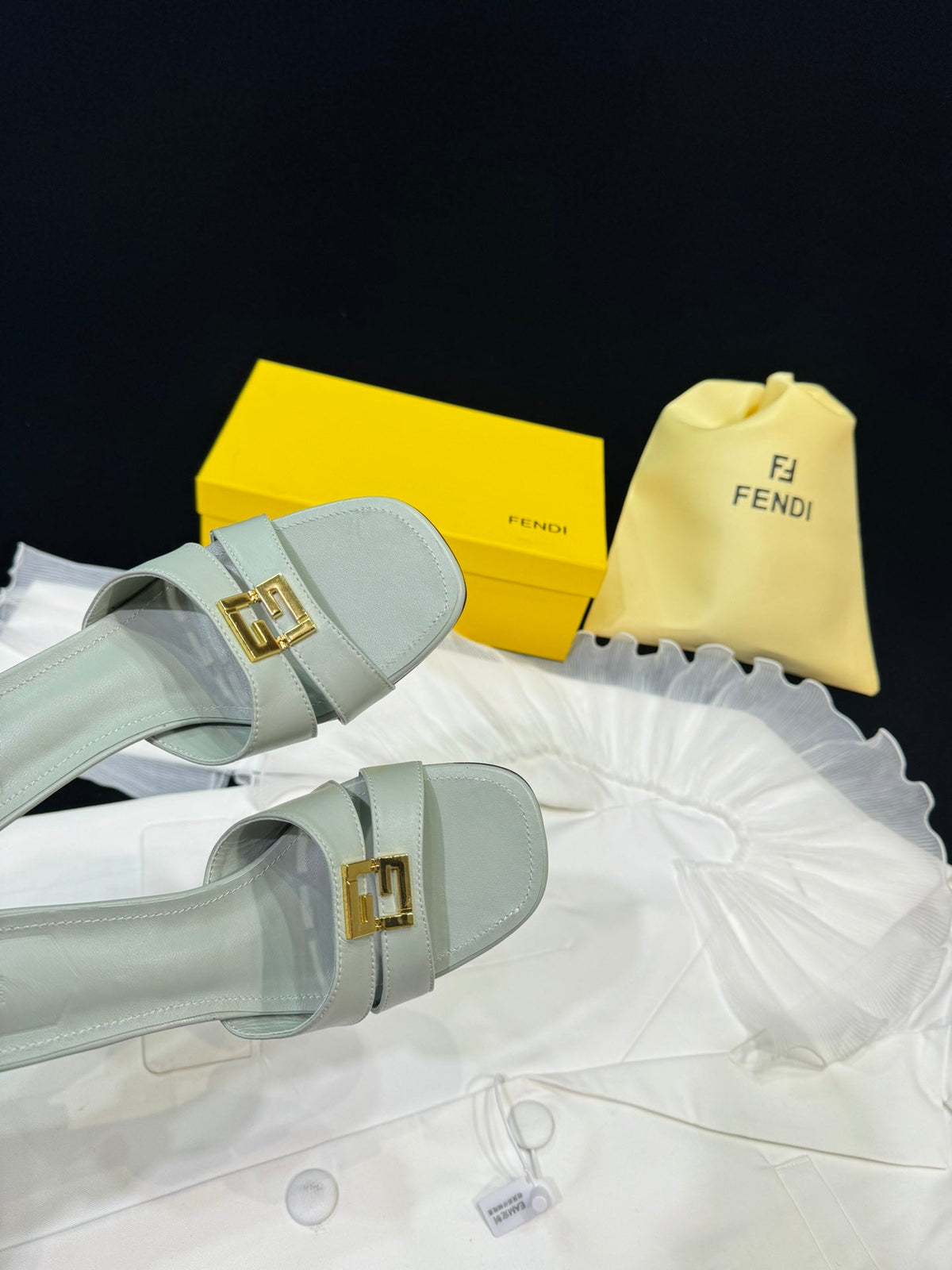 FENDI MEDIUM-HEELED 55 MM MULE IN ASH GREY LAMBSKIN WITH GOLD HARDWARE