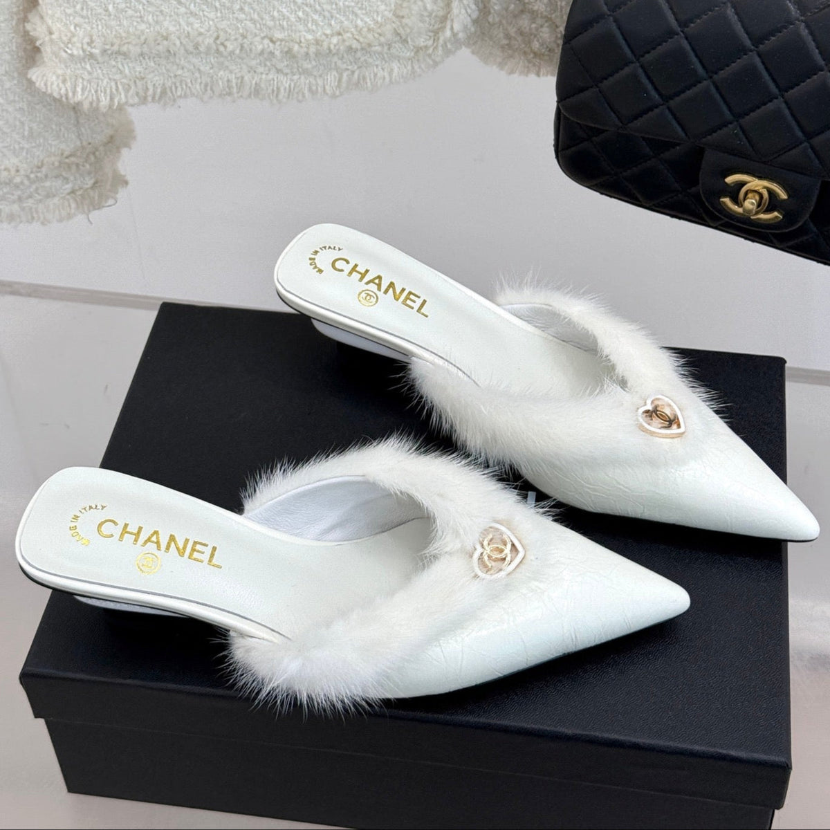 RABBIT FUR POINTED-TOE MULE IN WHITE LAMBSKIN