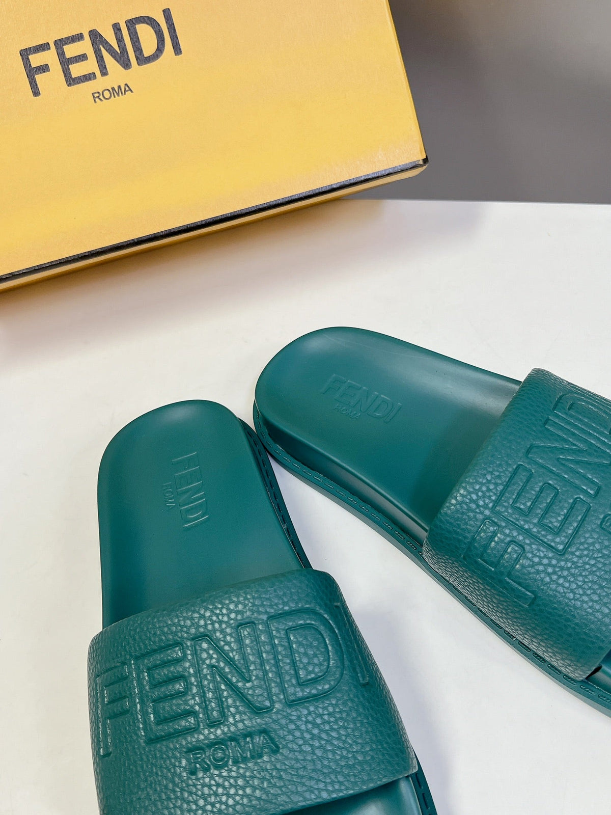 FENDI ROMA SLIDES IN TEAL GREEN LAMBSKIN LEATHER