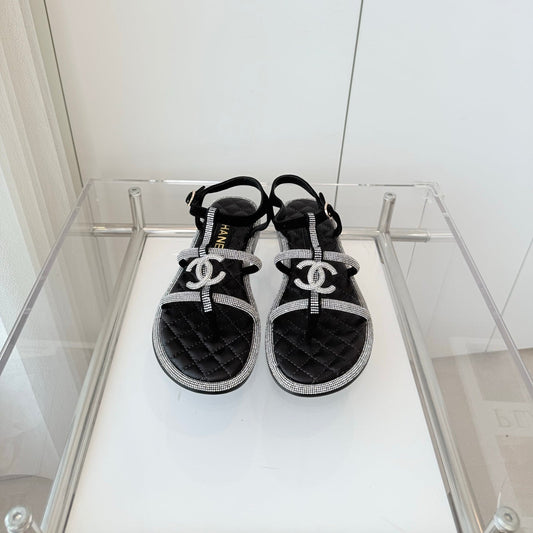 FLAT SANDALS IN BLACK SOFT LEATHER WITH SILVER STONE