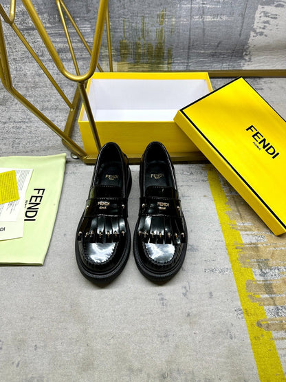 FENDI BAGUETTE LOAFERS IN BLACK CALFSKIN WITH GOLD HARDWARE