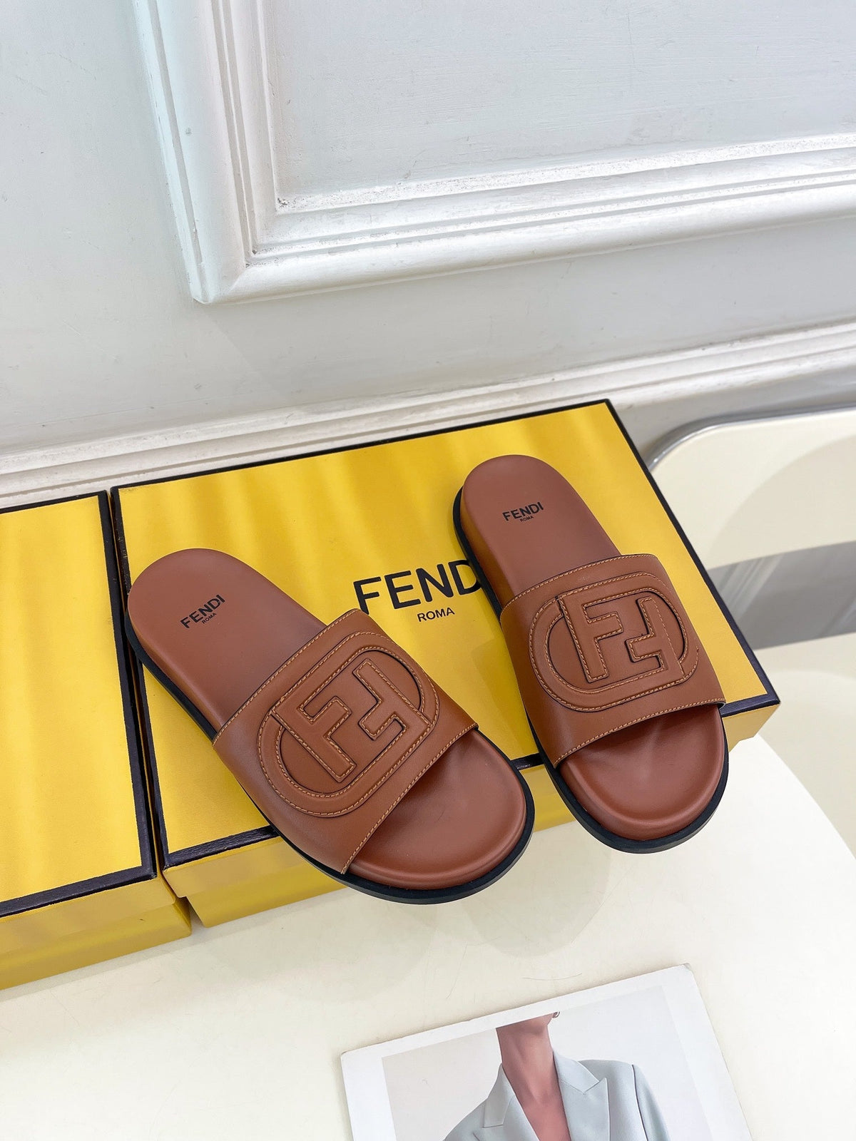 FENDI LOGO SLIDES IN SYRUP BROWN CALFSKIN