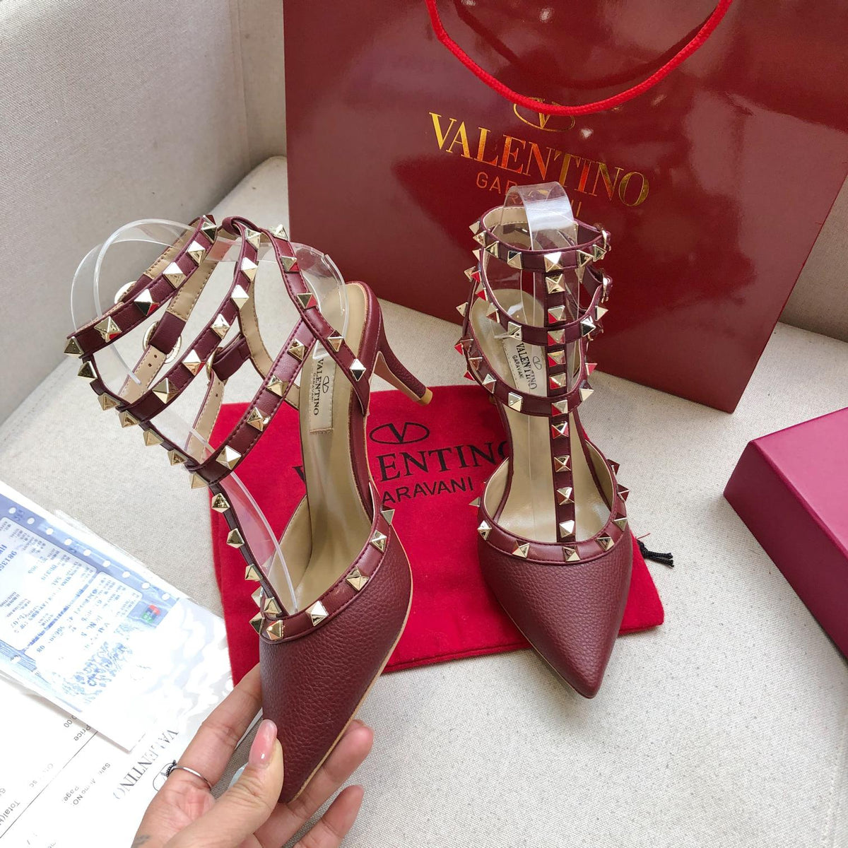 ROCKSTUD SANGRIA RED METALLIC CALFSKIN ANKLE STRAP HIGH SANDAL