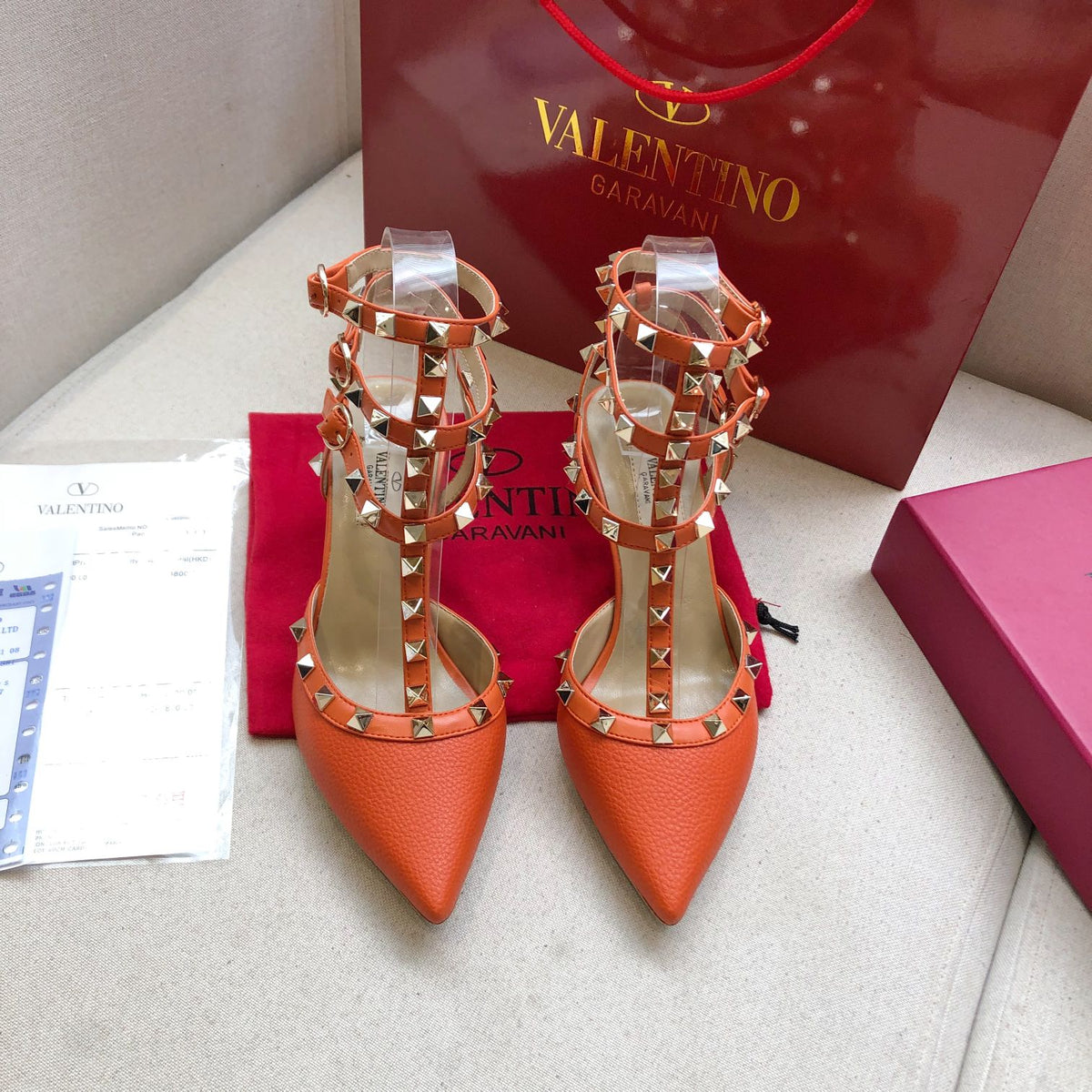 ROCKSTUD FIRE ORANGE METALLIC CALFSKIN ANKLE STRAP HIGH SANDAL